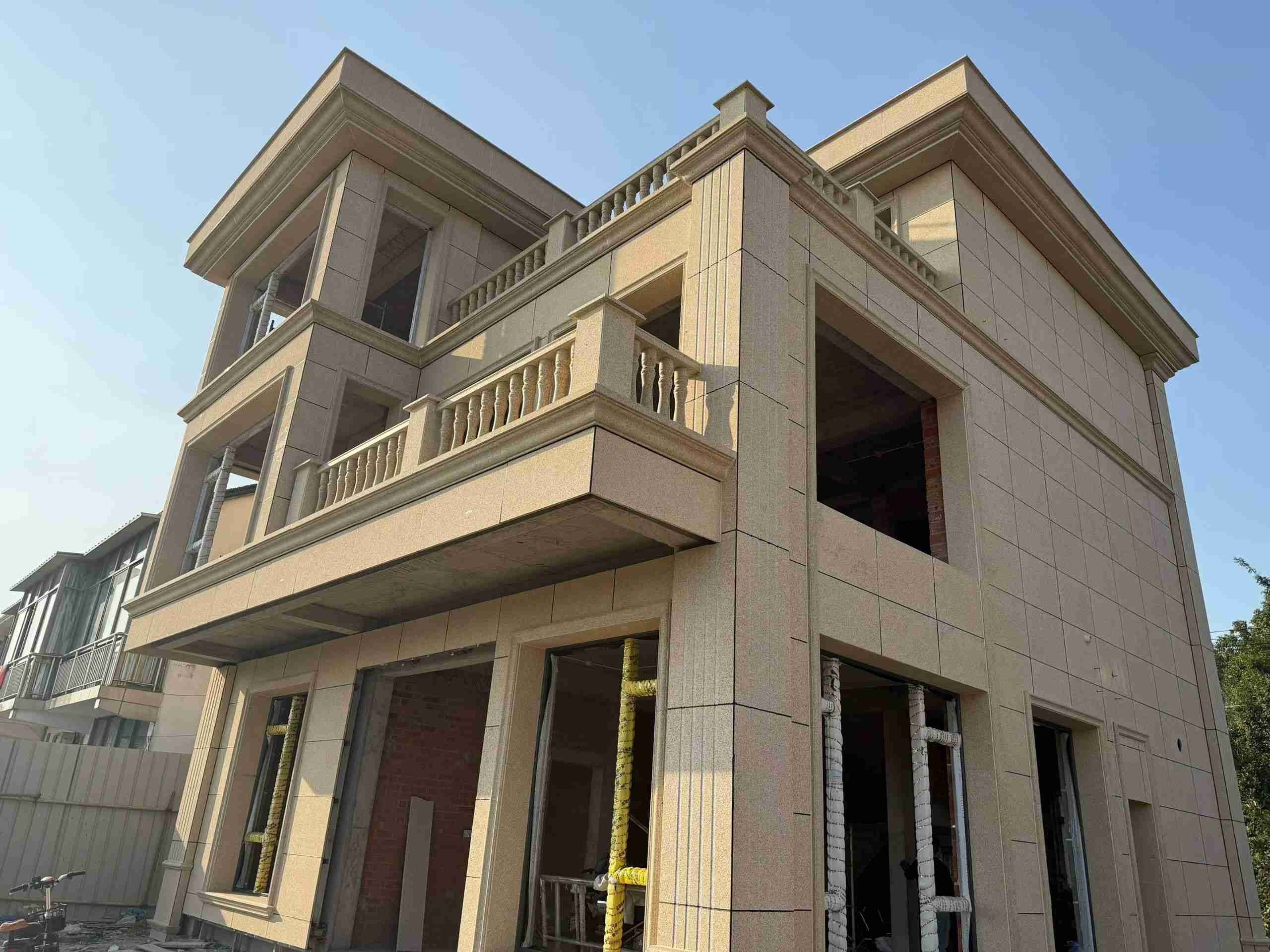 宿迁 黄金麻花岗岩石材荔枝面外墙干挂效果展示